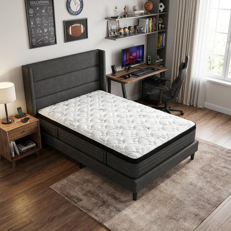 Twin hybrid mattress with quilted white top on dark gray base frame