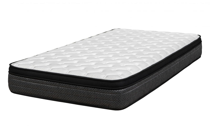 Foam mattress with white quilted top and dark charcoal base, black border