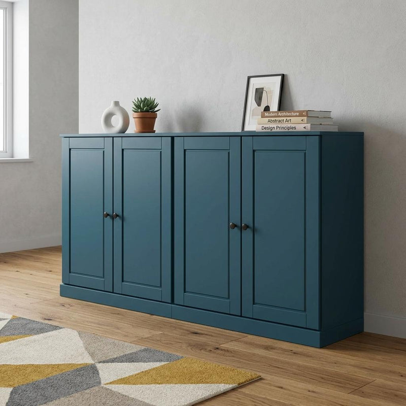 Teal blue wooden sideboard with four cabinet doors, set in a living room