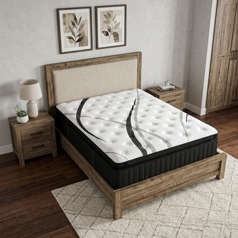 Hybrid mattress with white top and gray cloud print on wooden bed frame