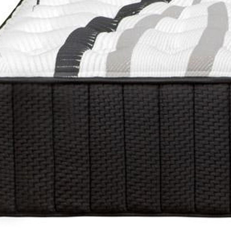 RV king hybrid mattress side detail: dark textured fabric with white quilted top