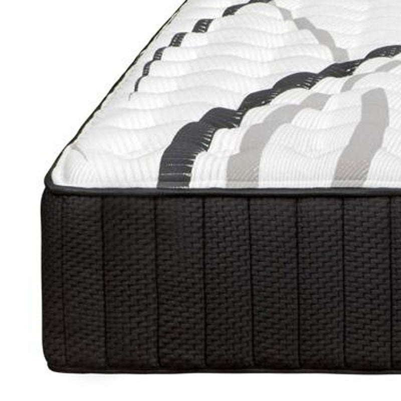 RV king hybrid mattress close-up: dark textured side panels and white quilted top