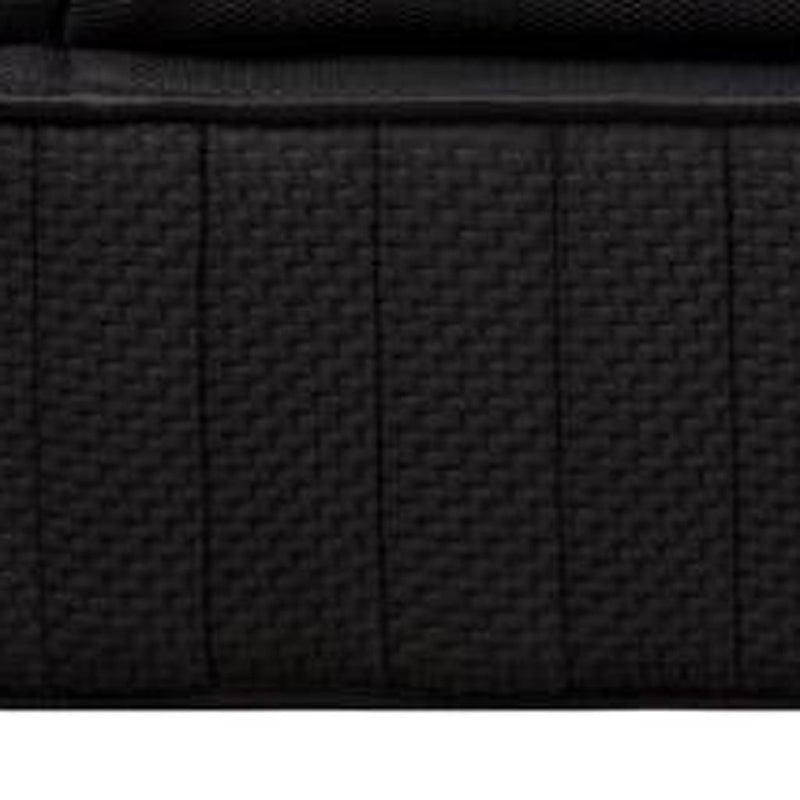 Black mattress side panel with textured grid stitching and piping detail.