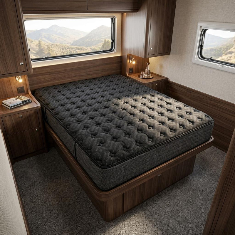 Black hybrid mattress with quilted top on a platform bed