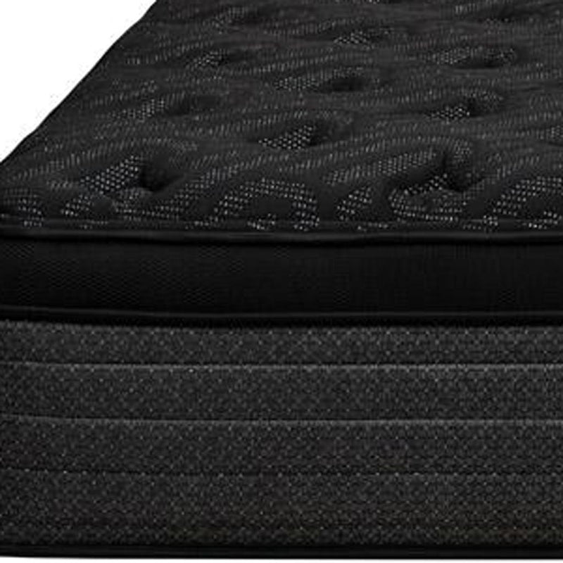 Close-up of black quilted euro top mattress with textured fabric pattern