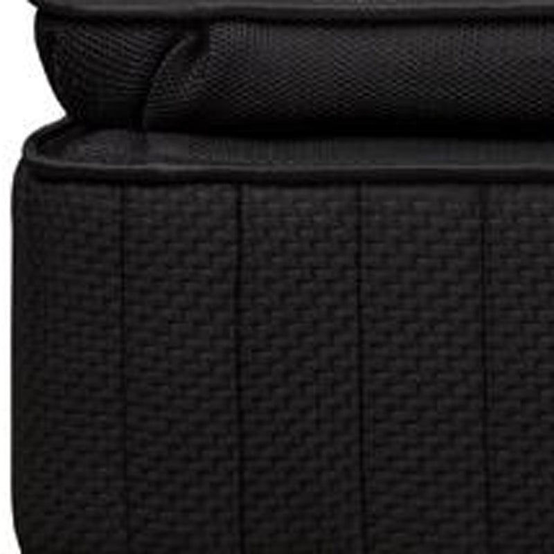 Close-up of black mattress side panel stitching with textured fabric