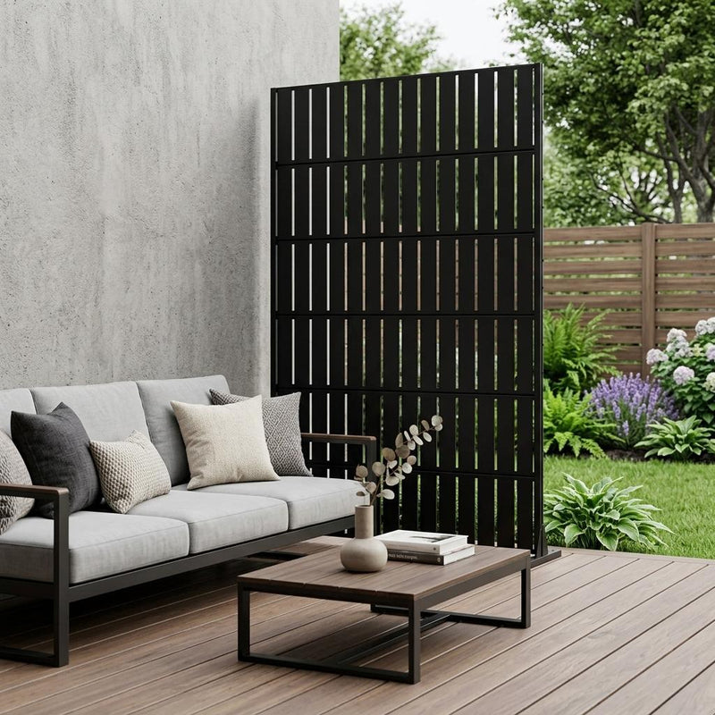 Black outdoor privacy screen with vertical slats on a patio deck
