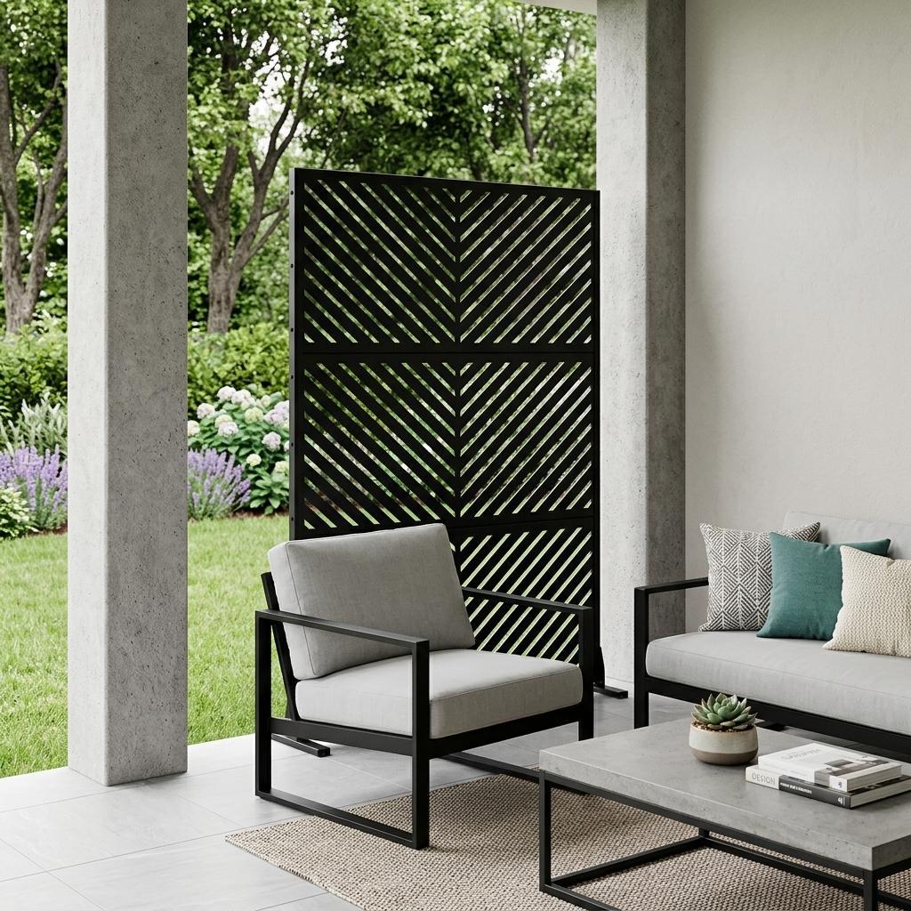 Black steel outdoor privacy screen with diagonal stripe design behind outdoor seating