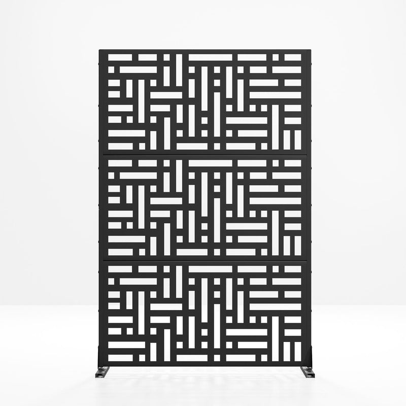 Black steel outdoor privacy screen panel on freestanding frame with geometric cutouts