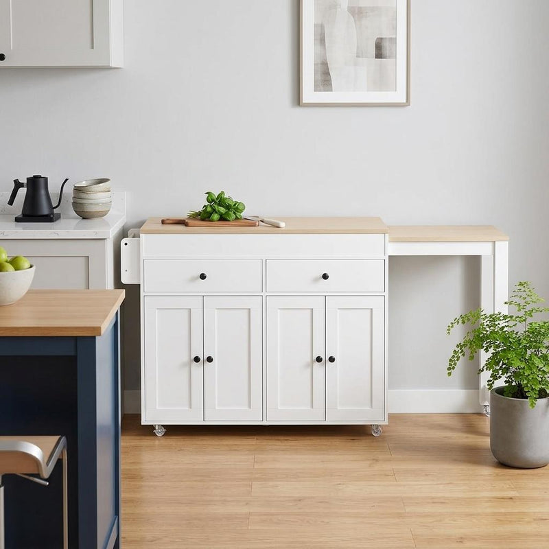 Rolling kitchen cart with white cabinet, brown wood top, drawers and paneled cabinet doors