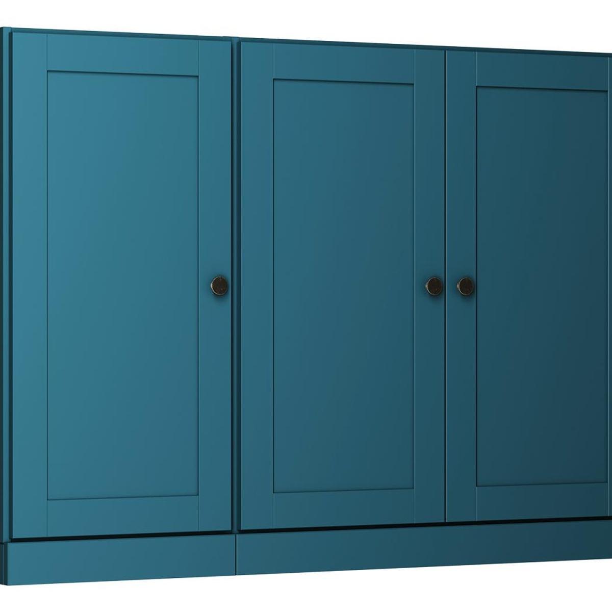 Teal blue sideboard door panels with round metal knobs, close-up