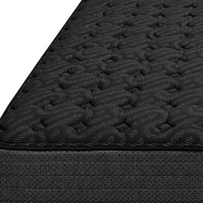 Dark quilted mattress top fabric with dense stitched texture detail