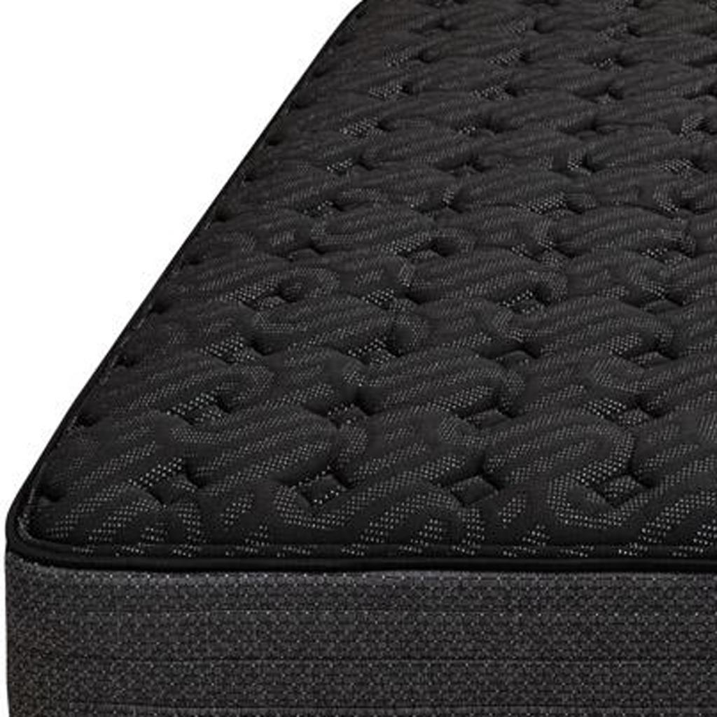 Black patterned memory foam mattress with quilted design and breathable fabric for enhanced comfort and support.