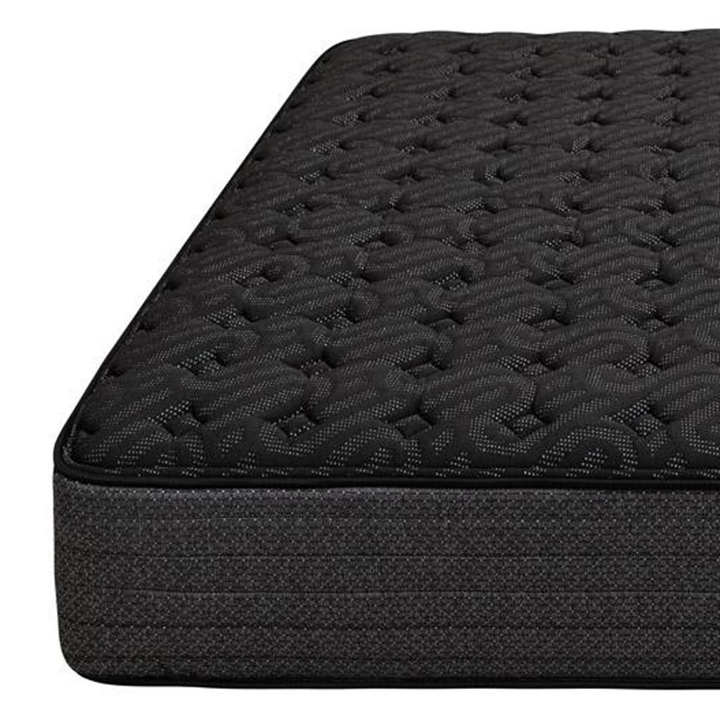 Black quilted mattress with a sleek design, featuring textured fabric and a supportive base for ultimate comfort.