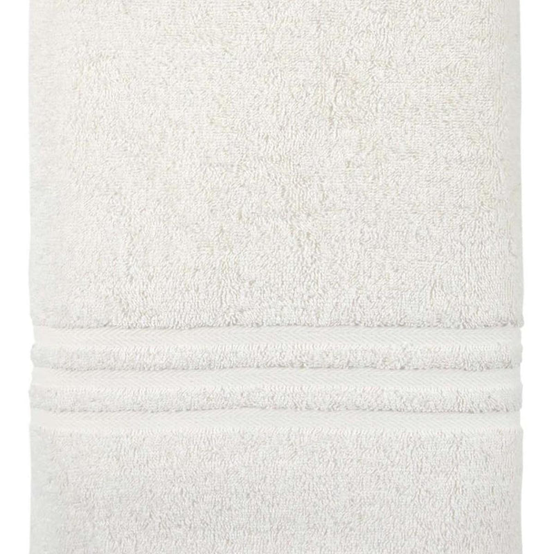 Beige Turkish cotton bath sheet towel close-up of stitched hem band and terry loops