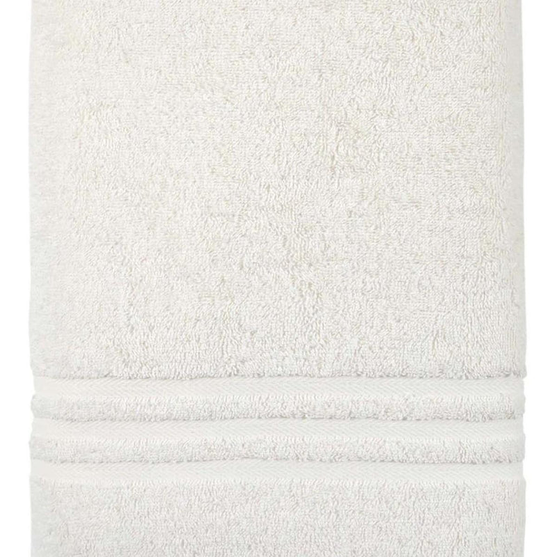 Beige Turkish cotton bath sheet towel close-up of looped terry texture and hem band