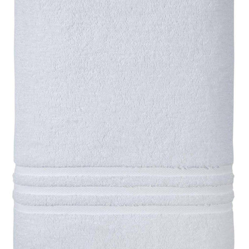 White Turkish cotton bath sheet close-up of folded hem and stacked bands