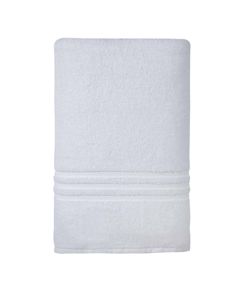 White Turkish cotton bath sheet, neatly folded rectangle towel on light background