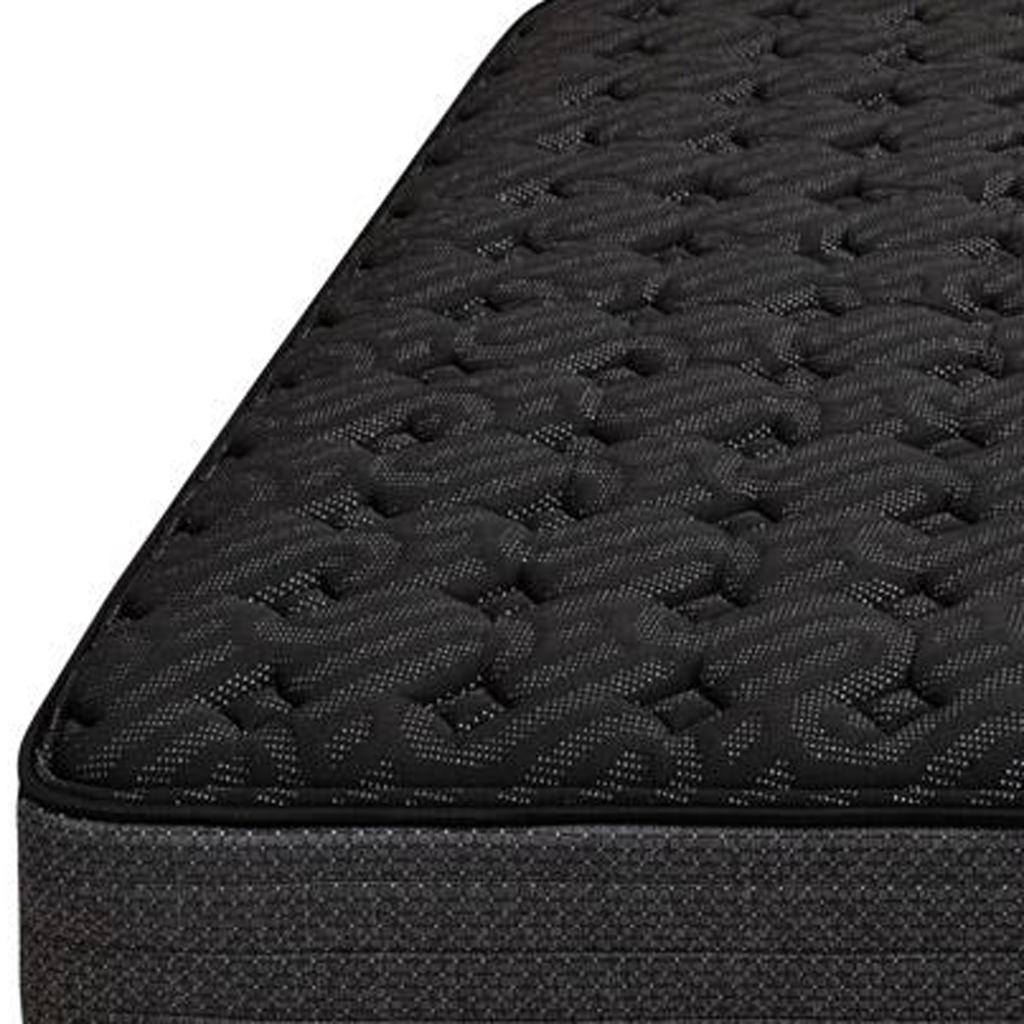 Black memory foam mattress with intricate textured pattern for enhanced comfort and support.