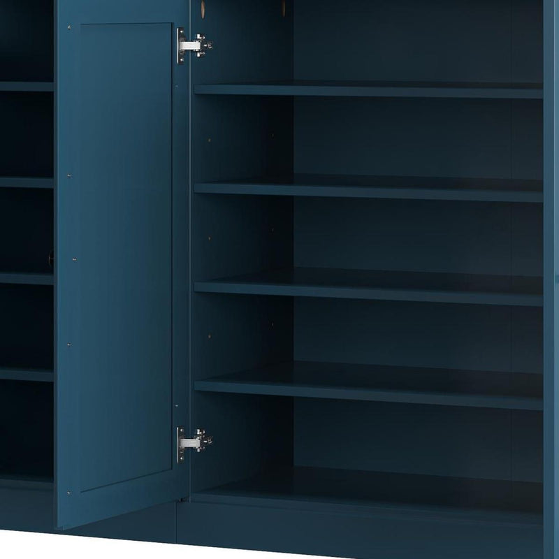 Teal blue wood shoe storage cabinet interior with open door and horizontal shelves