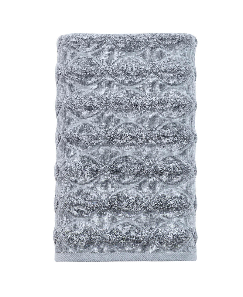Light gray jacquard bath towel with raised circular geometric weave, folded