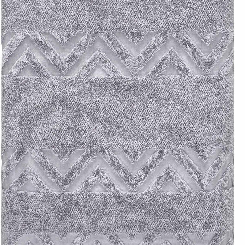 Light gray Turkish cotton towel with horizontal chevron jacquard trim, close-up