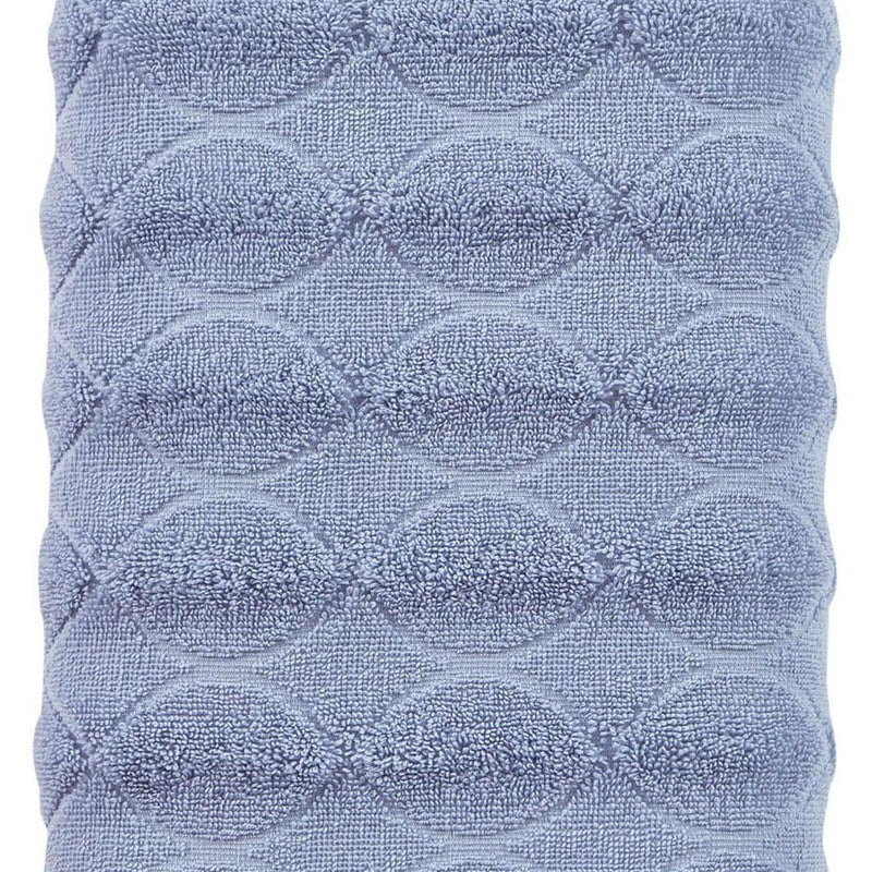 Blue bath towel jacquard oval scallop loop texture, detailed close-up