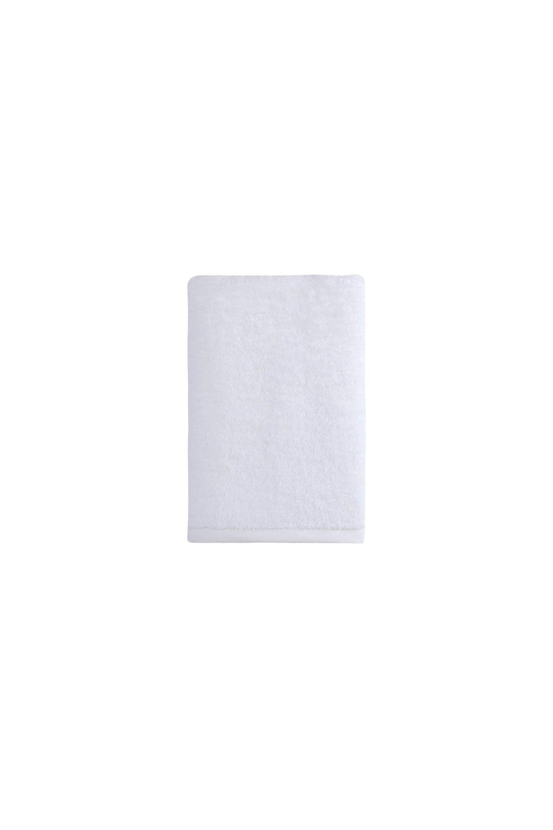 White cotton bath towel, small folded square with soft terry texture