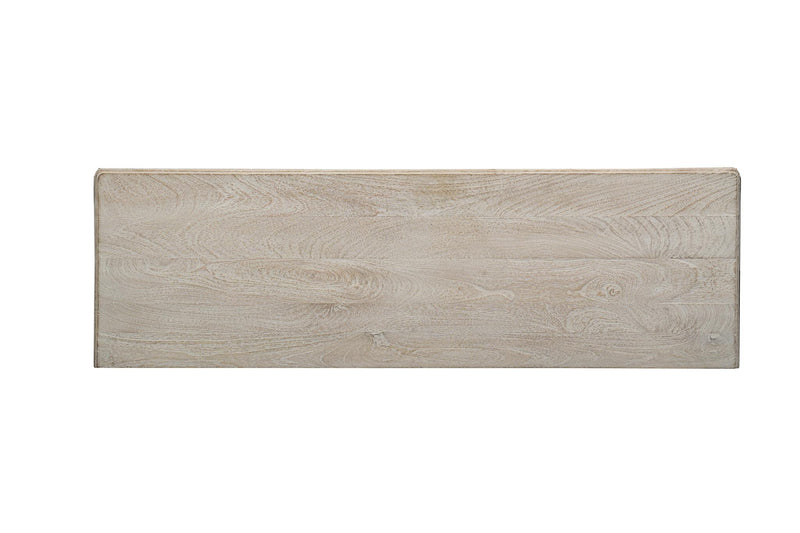 Whitewashed solid wood dresser drawer front with carved floral panel, horizontal view