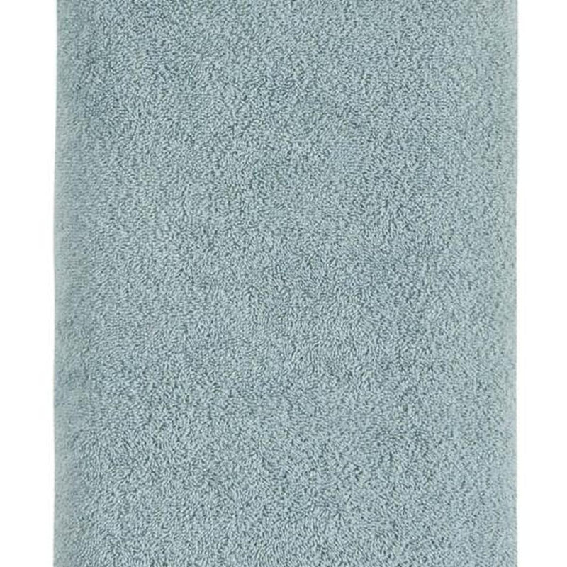 Close-up of light blue cotton bath towel looped texture