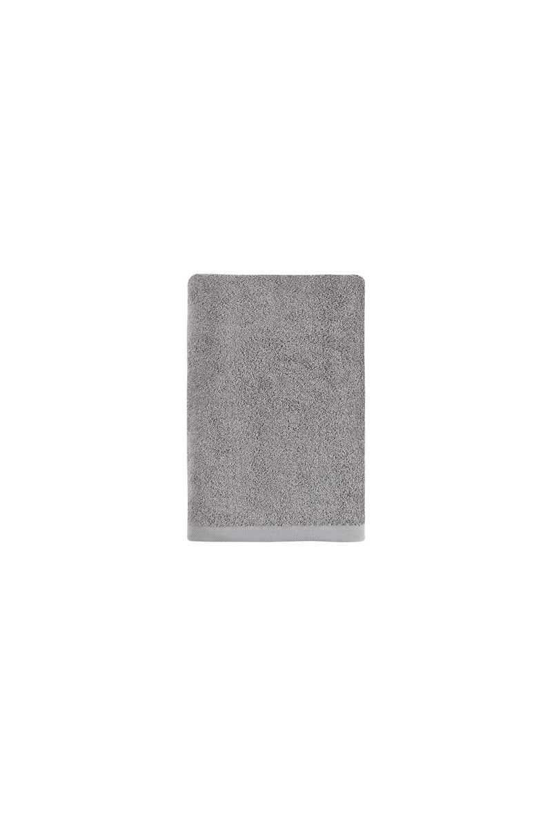 Light gray Turkish cotton bath towel, neatly folded
