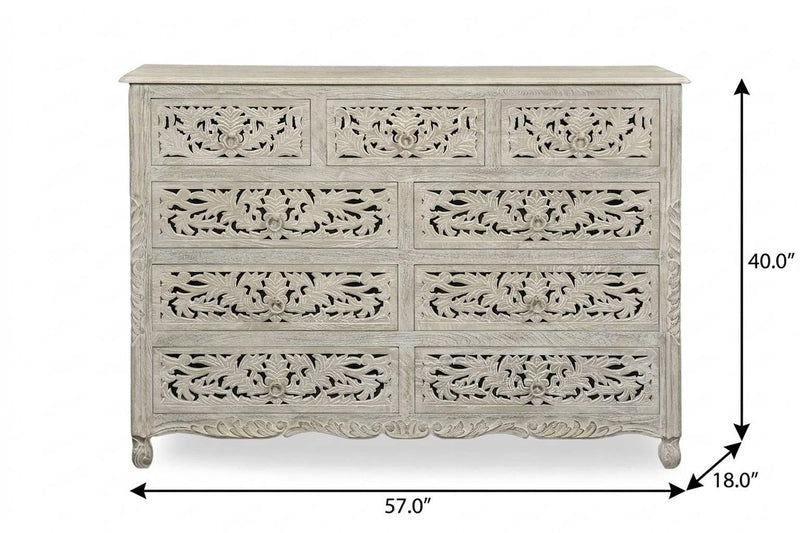 Gray carved wood nine-drawer dresser, 57 in wide and 40 in high
