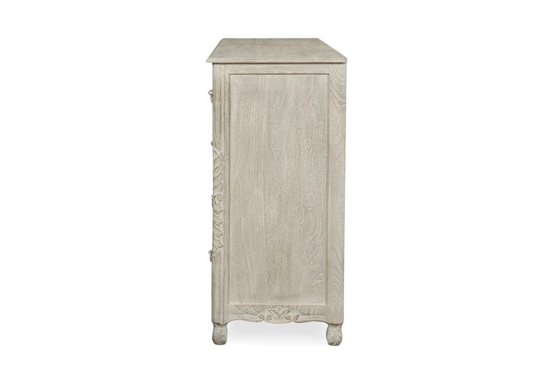 Gray carved wood dresser side panel with floral carving and tapered legs
