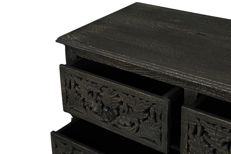 Dark carved wooden dresser top and open drawer compartments
