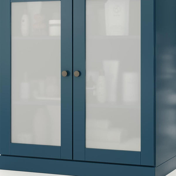 Teal blue double-door cabinet with glass panels and round brass knobs
