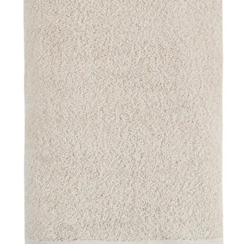 Beige Turkish cotton bath towel fabric close-up, fine loop texture