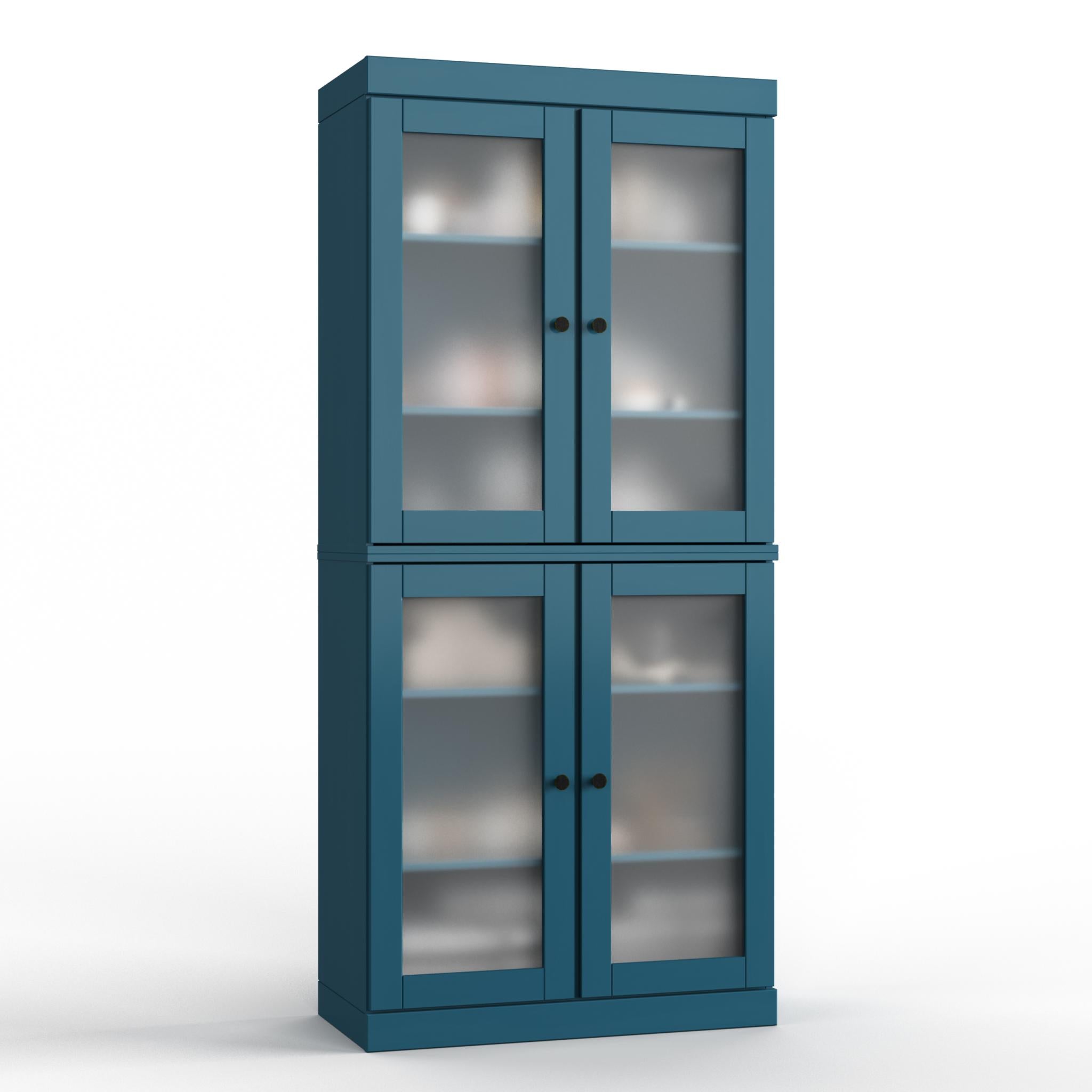 Teal blue wood linen cabinet with four glass shelves behind double doors