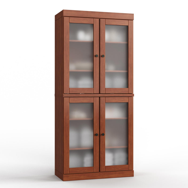 Solid wood linen cabinet with four glass doors and black knobs, warm wood finish.