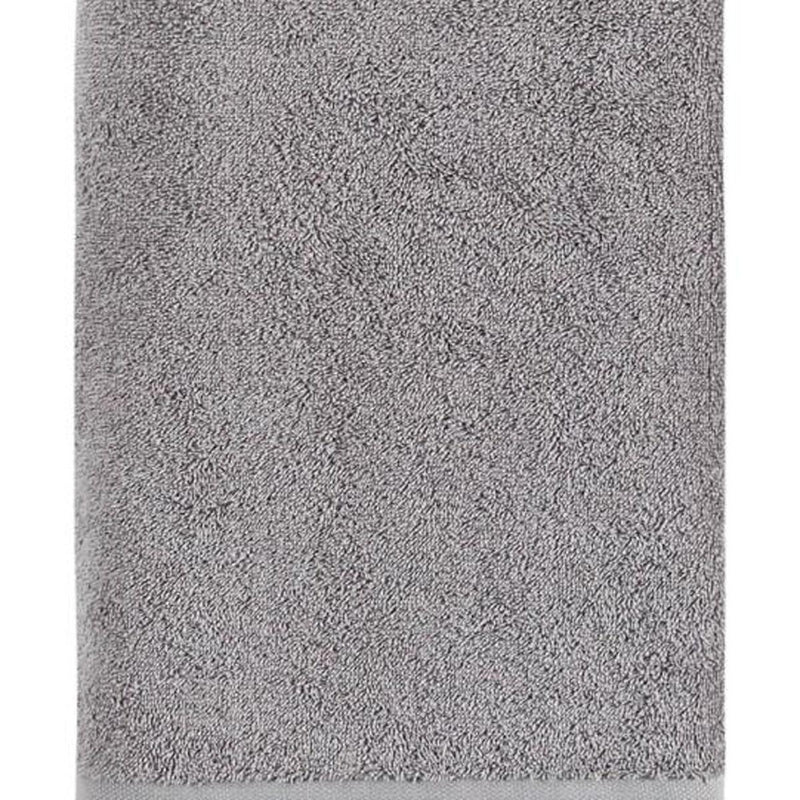 Light gray Turkish cotton bath towel with textured looped terry surface close-up
