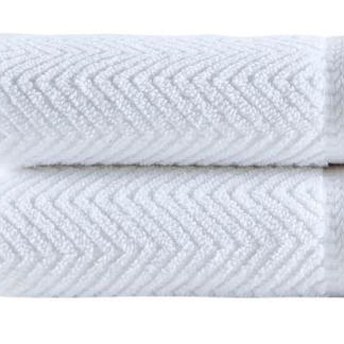 White chevron Turkish cotton towel, close-up of stitched zigzag texture on folded face