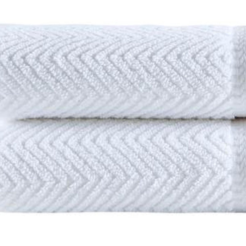 White chevron Turkish cotton towel, close-up of stitched zigzag texture on folded face