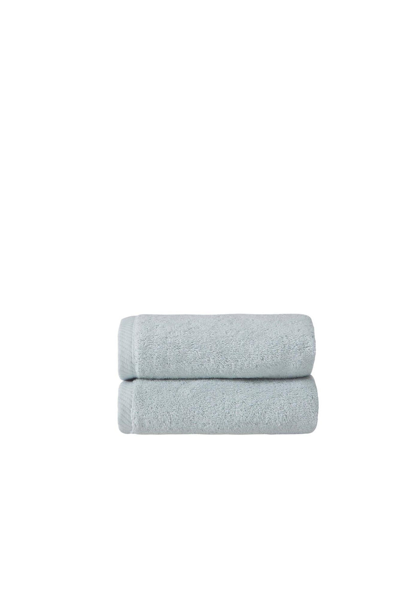 Set of two Turkish cotton hand towels, light aqua blue, neatly folded pair