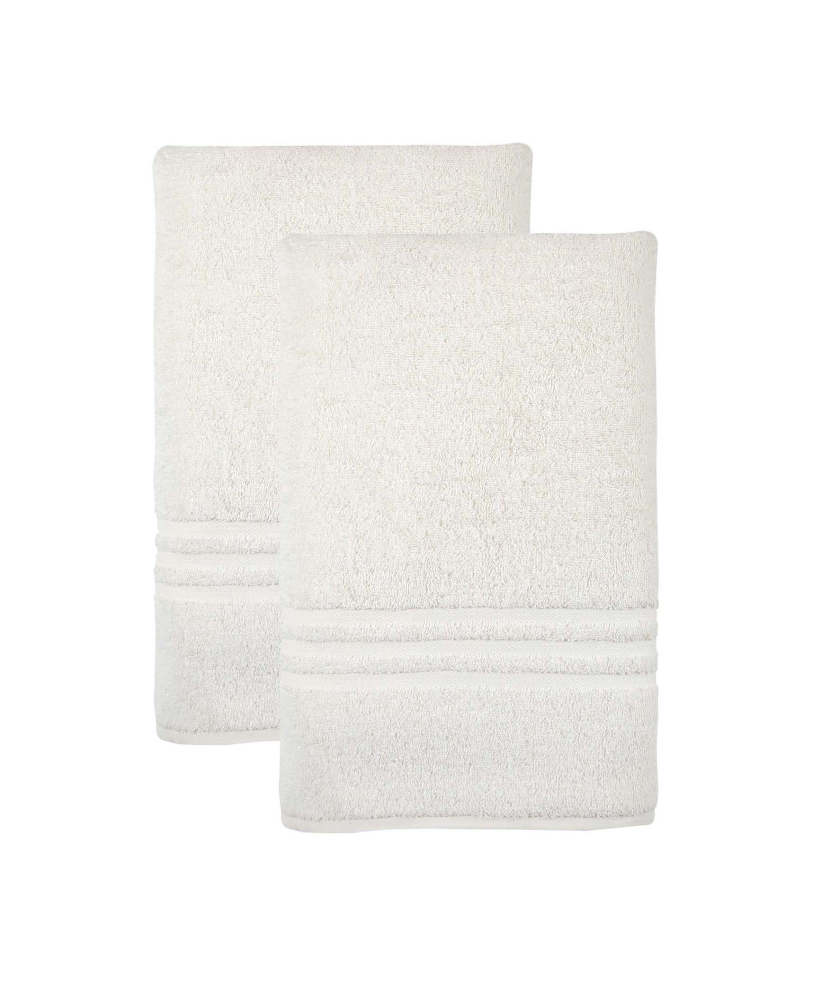 Set of two light beige bath sheets, stacked with matching stitched borders