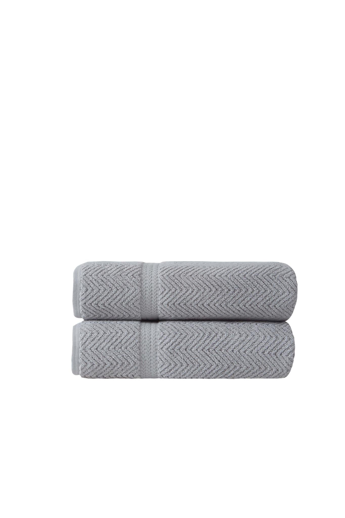 Two light gray chevron Turkish cotton bath towels, neatly folded set