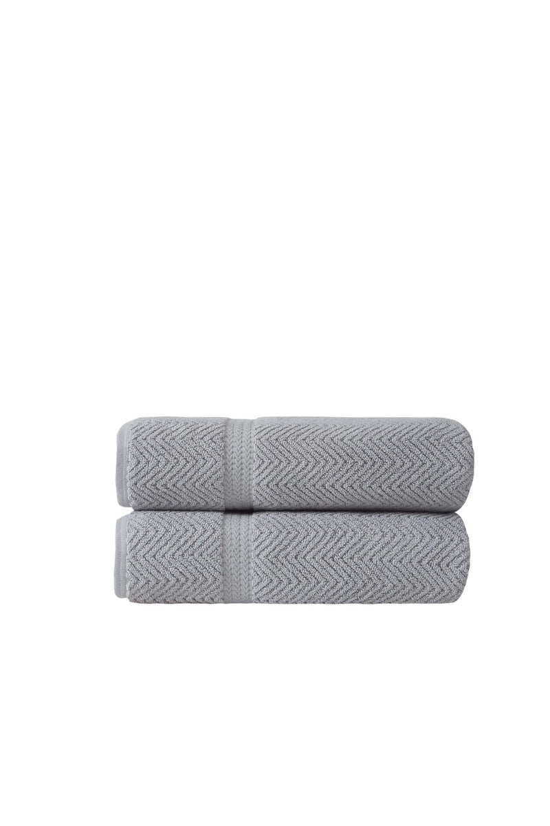 Two light gray chevron Turkish cotton bath towels, neatly folded set