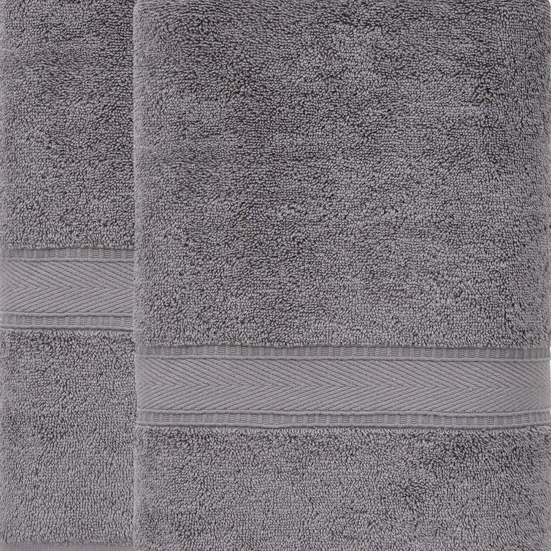 Dark gray bath sheet close-up with textured loop pile and light stripe trim