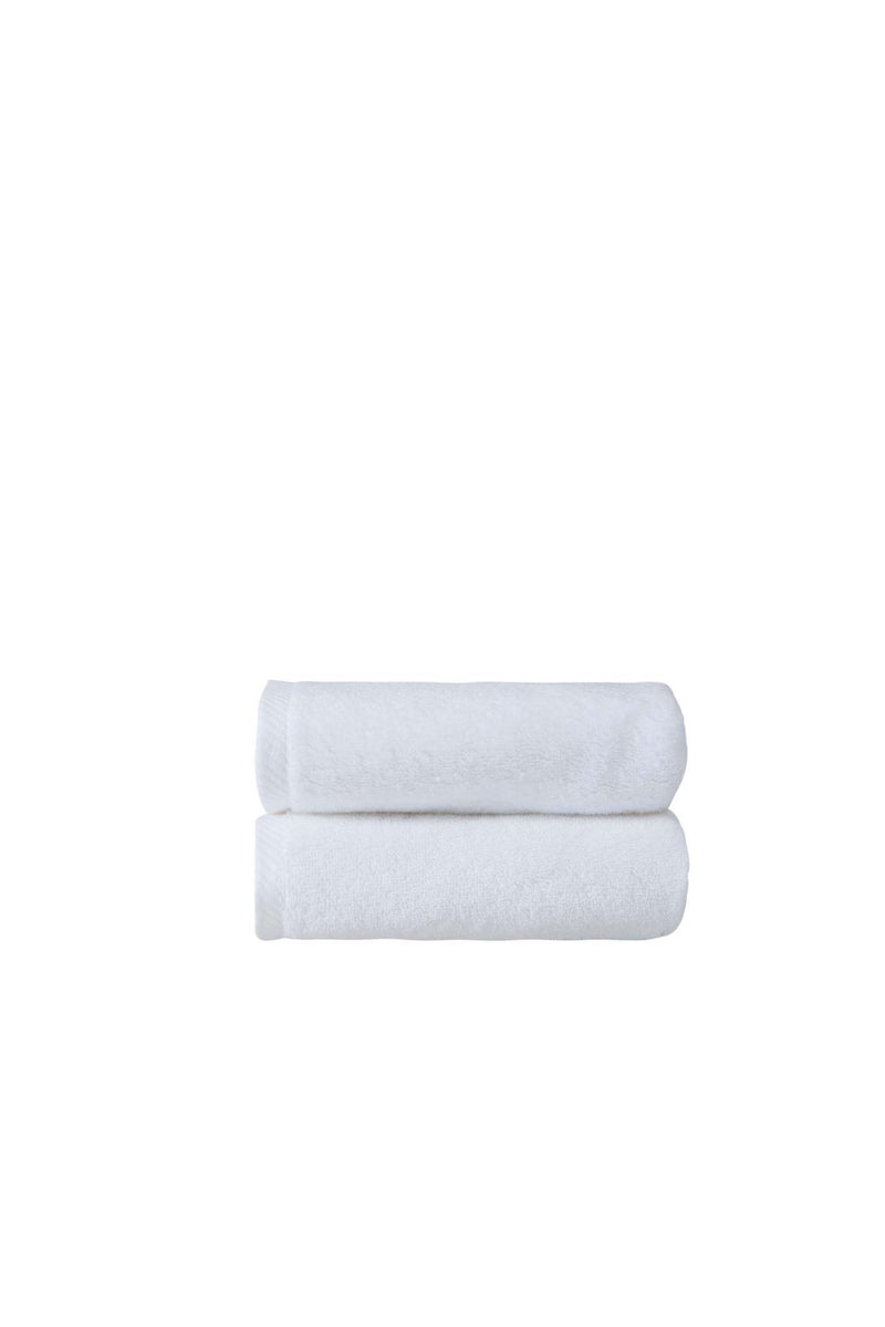 Set of two white hand towels, neatly folded stack