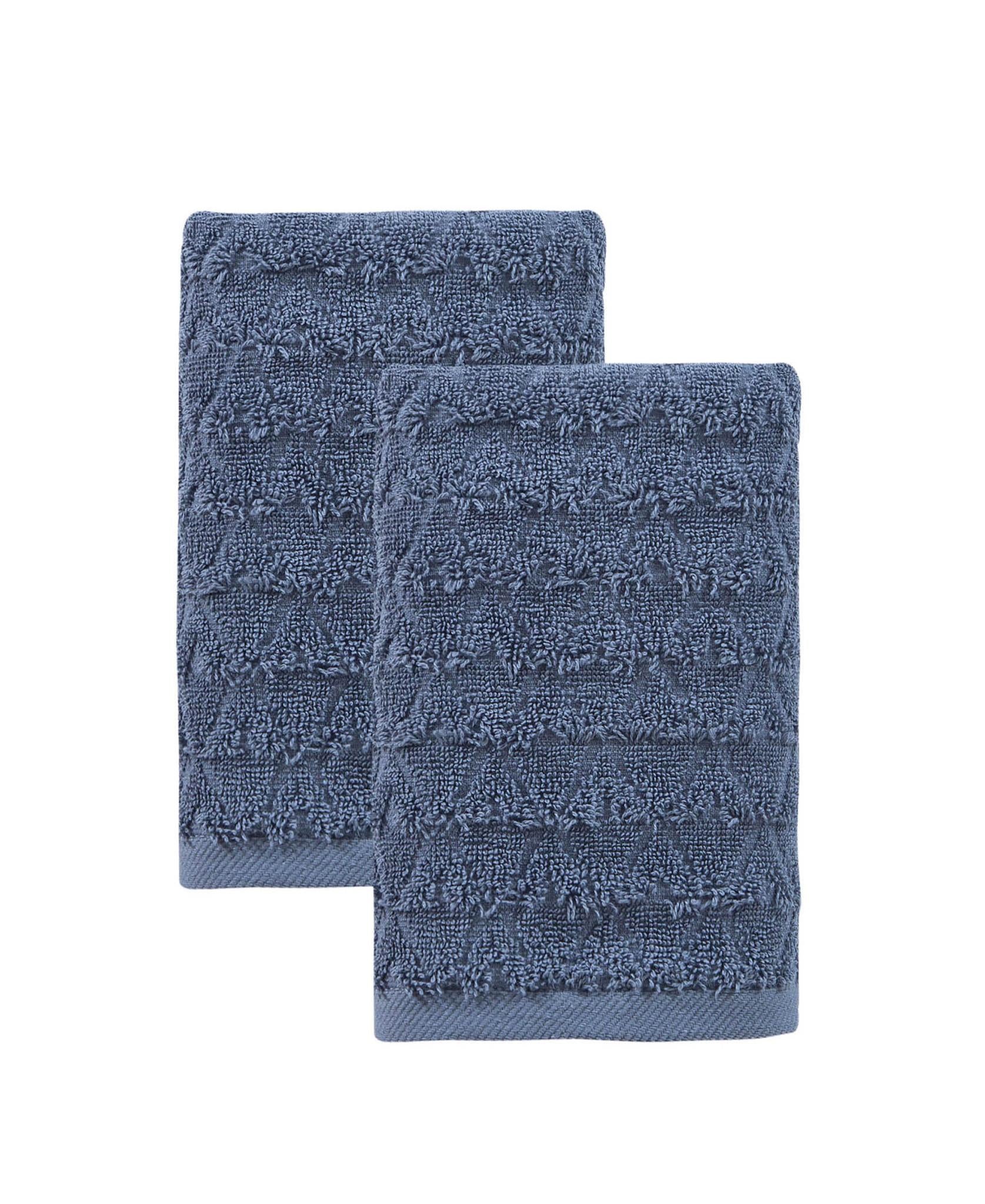Set of two navy geometric bath towels, folded with textured looped weave