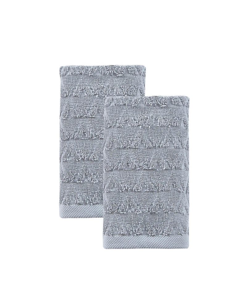 Two light gray geometric Turkish cotton hand towels, folded side view