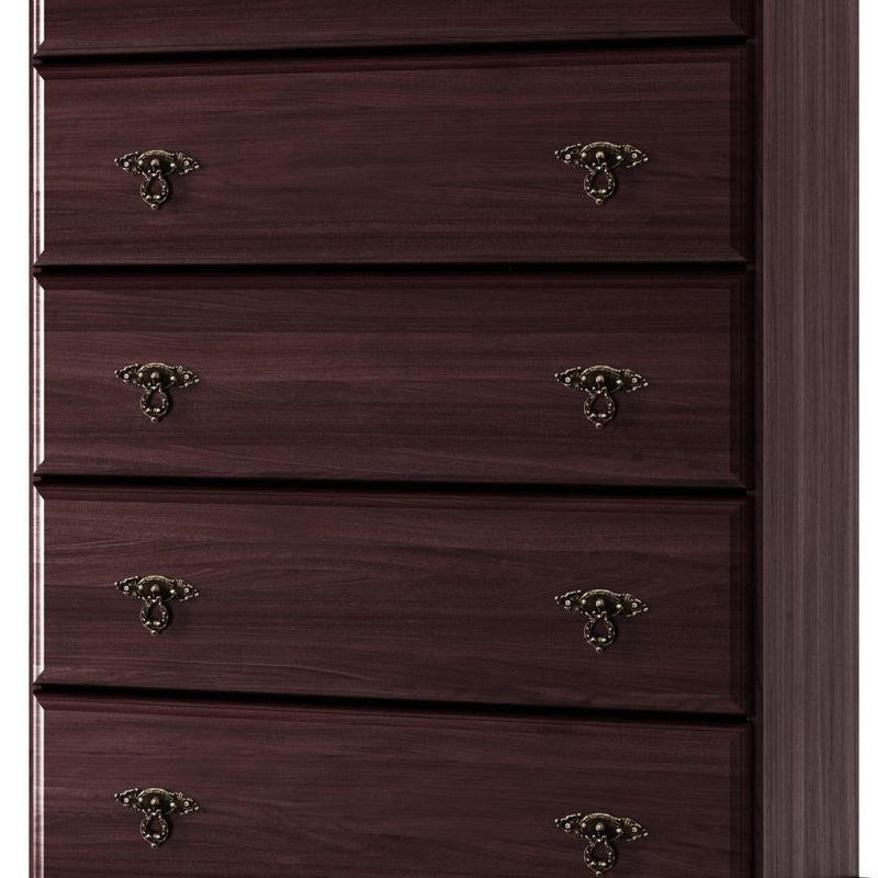 Close-up of dark brown dresser drawers with ornate metal pull handles